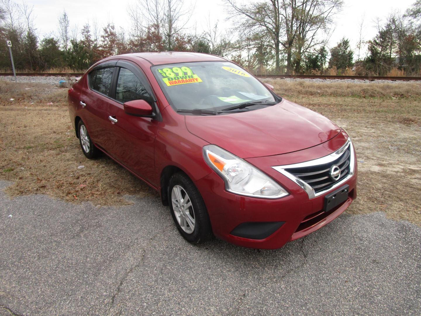 2016 Red Nissan Versa 1.6 S 5M (3N1CN7AP7GL) with an 1.6L L4 DOHC 16V engine, 5M transmission, located at 2553 Airline Blvd, Portsmouth, VA, 23701, (757) 488-8331, 36.813889, -76.357597 - Photo#3